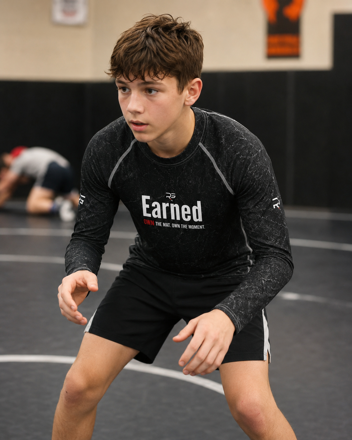 Roll Gear Earned Not Given Long Sleeve Rash Guard - Black, Youth, product photo.