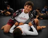 Roll Gear Evolve or Repeat Rash Guard - Kids, product image 1.