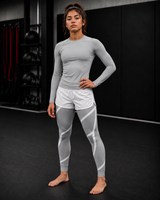 Roll Gear Grey Swirl Spats – Grey/White – Youth, front view on a teen boy.