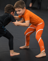 Roll Gear Orange Swirl Spats - Orange/White, Kids, product photo.