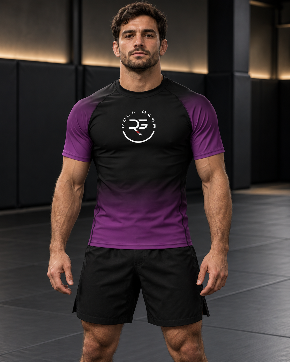 Roll Gear Fade Short Sleeve Rash Guard – Adult, front view on a man standing on the mat.