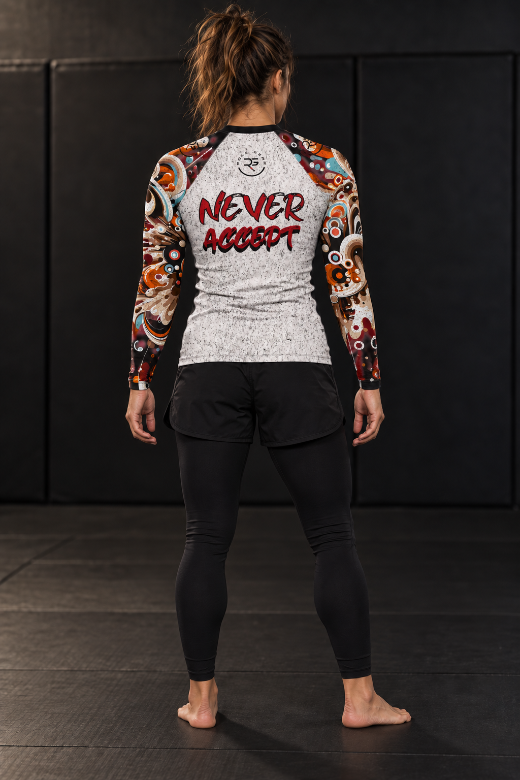 Roll Gear Never Accept Rash Guard – Black – Women’s, back view, Never Accept back print.