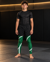 Roll Gear Green Swirl Spats – Green/White – Kids, front view on a boy.