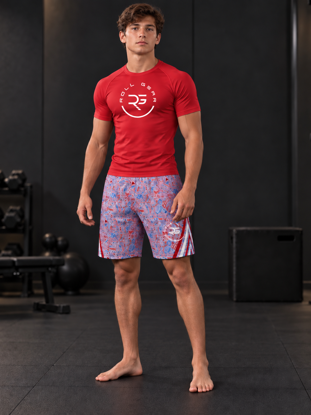 Roll Gear Stars & Scribbles Grappling Shorts – Boys', teen boy in a red top standing in a gym.