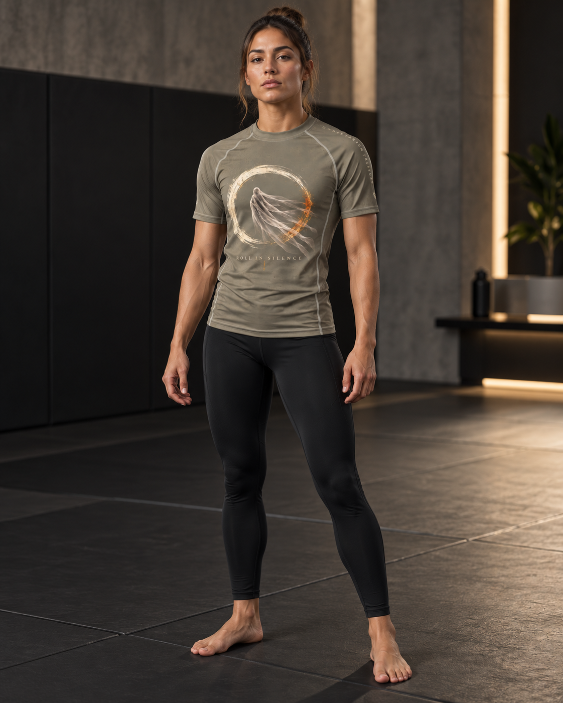 Roll Gear Phantom Pressure Short Sleeve Rash Guard – Olive – Adult Unisex, front view, female athlete.