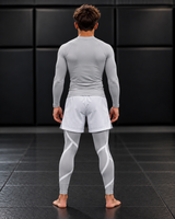 Roll Gear Grey Swirl Spats – Grey/White – Youth, back view on a teen boy.