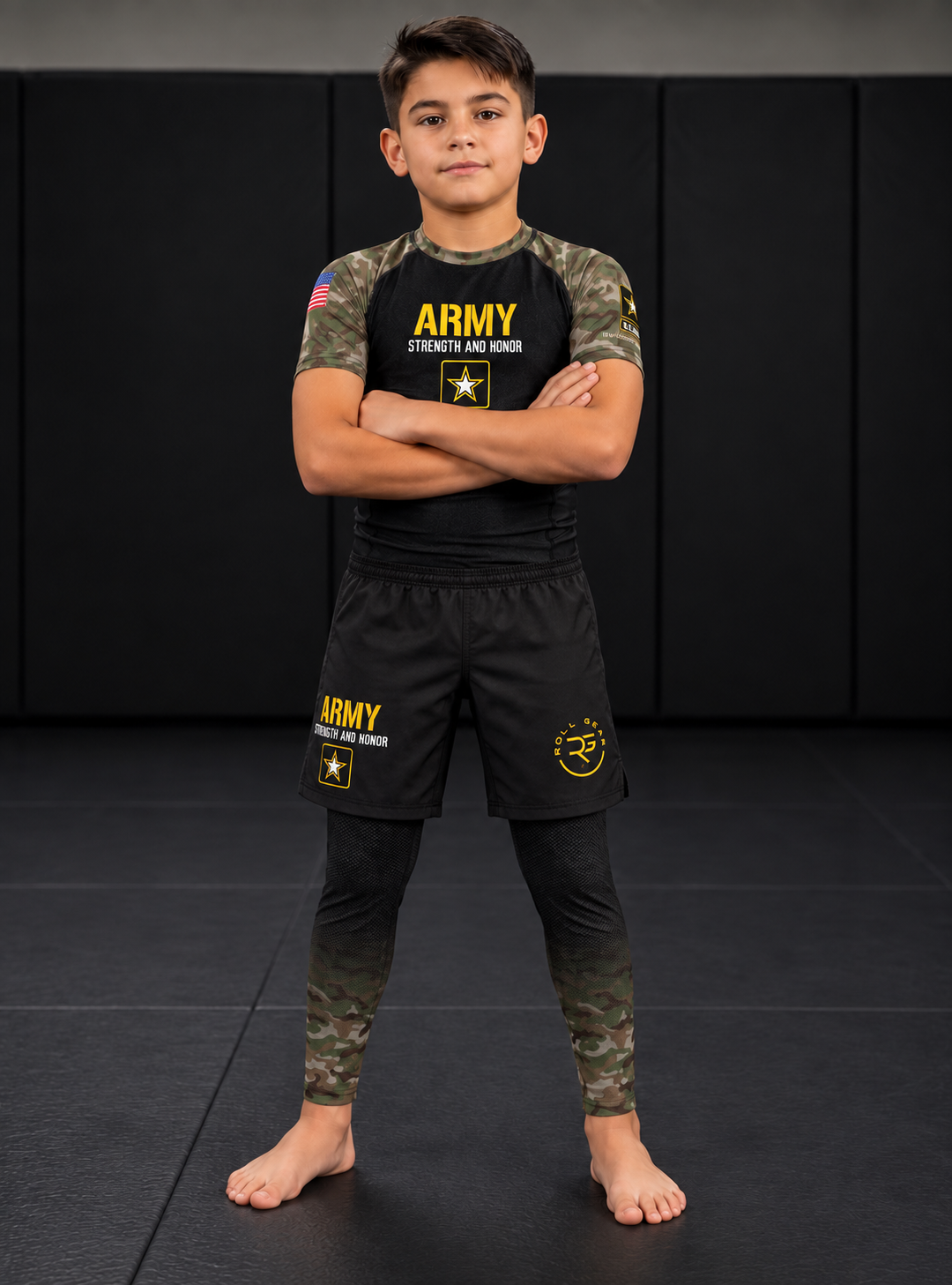 Roll Gear Youth Army Classic Compression Spats, worn with Army shorts and rash guard on the mat.