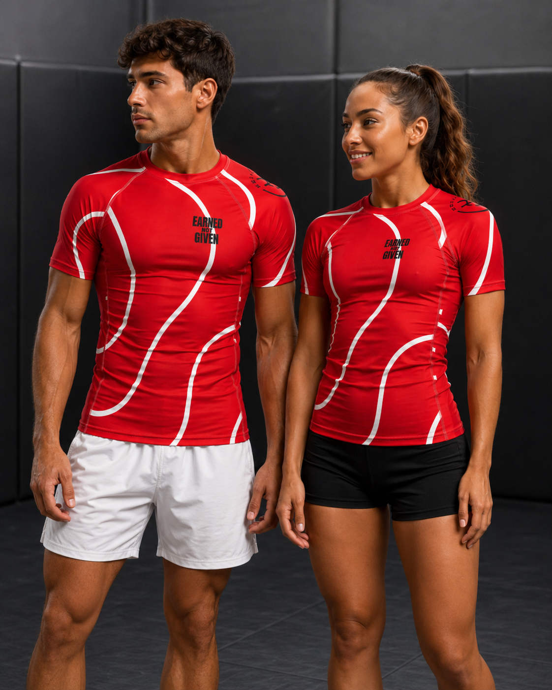 Roll Gear Red with White Lines Rash Guard – Short Sleeve, worn by two athletes.