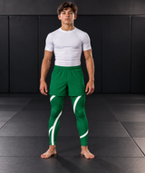 Roll Gear Green Swirl Spats – Green/White – Youth, front view on a teen boy.