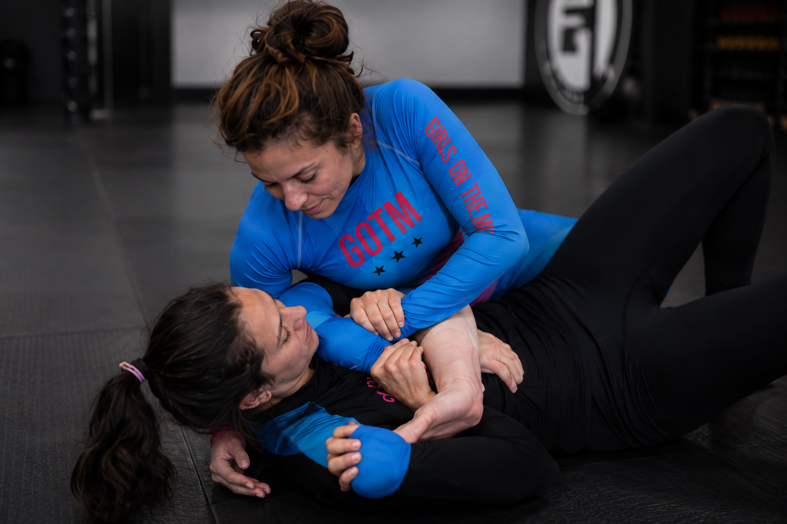 Roll Gear Women's Girls on the Mat BJJ Rash Guard - Blue Prism Gradient, product photo.