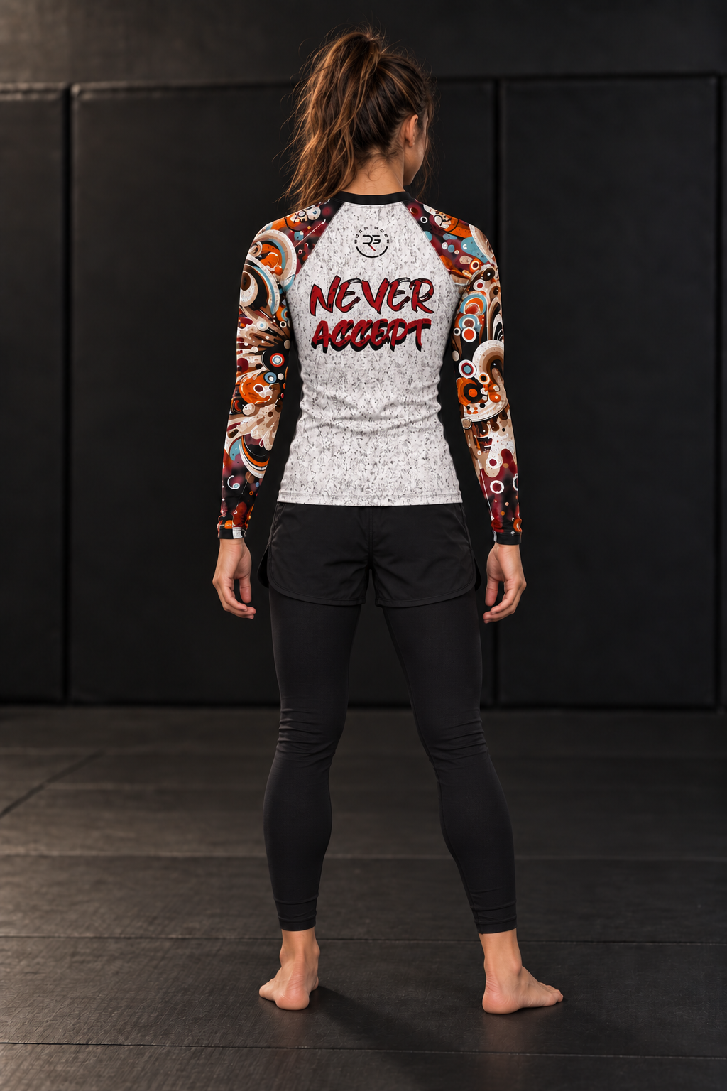 Roll Gear Never Accept Rash Guard – Black – Youth, back view, Never Accept back print.