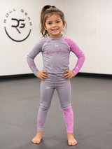 Roll Gear Embrace the Chaos Kids Performance Rash Guard, product photo.