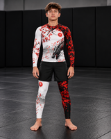 Roll Gear Shadow Dragon Warrior Spats – White & Crimson – Youth, front view on a teen boy on the mat.