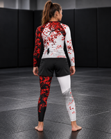 Roll Gear Shadow Dragon Warrior Spats – White & Crimson – Youth, back view on a teen girl.