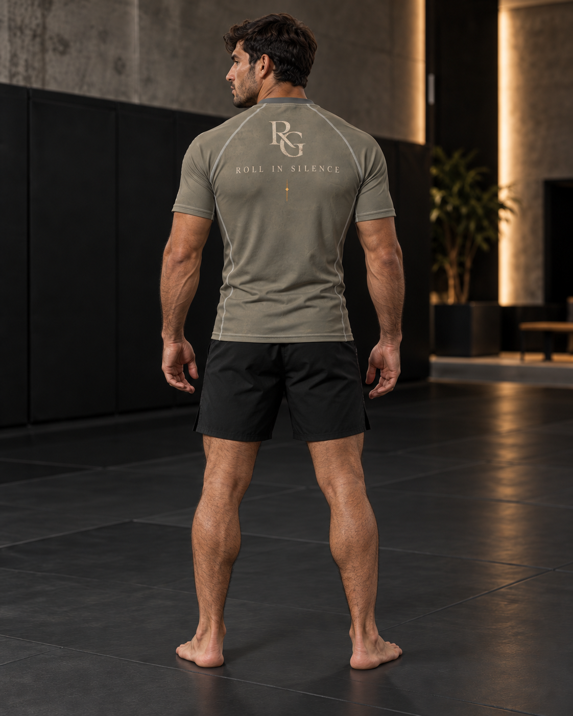 Roll Gear Phantom Pressure Short Sleeve Rash Guard – Olive – Adult Unisex, back view, male athlete.