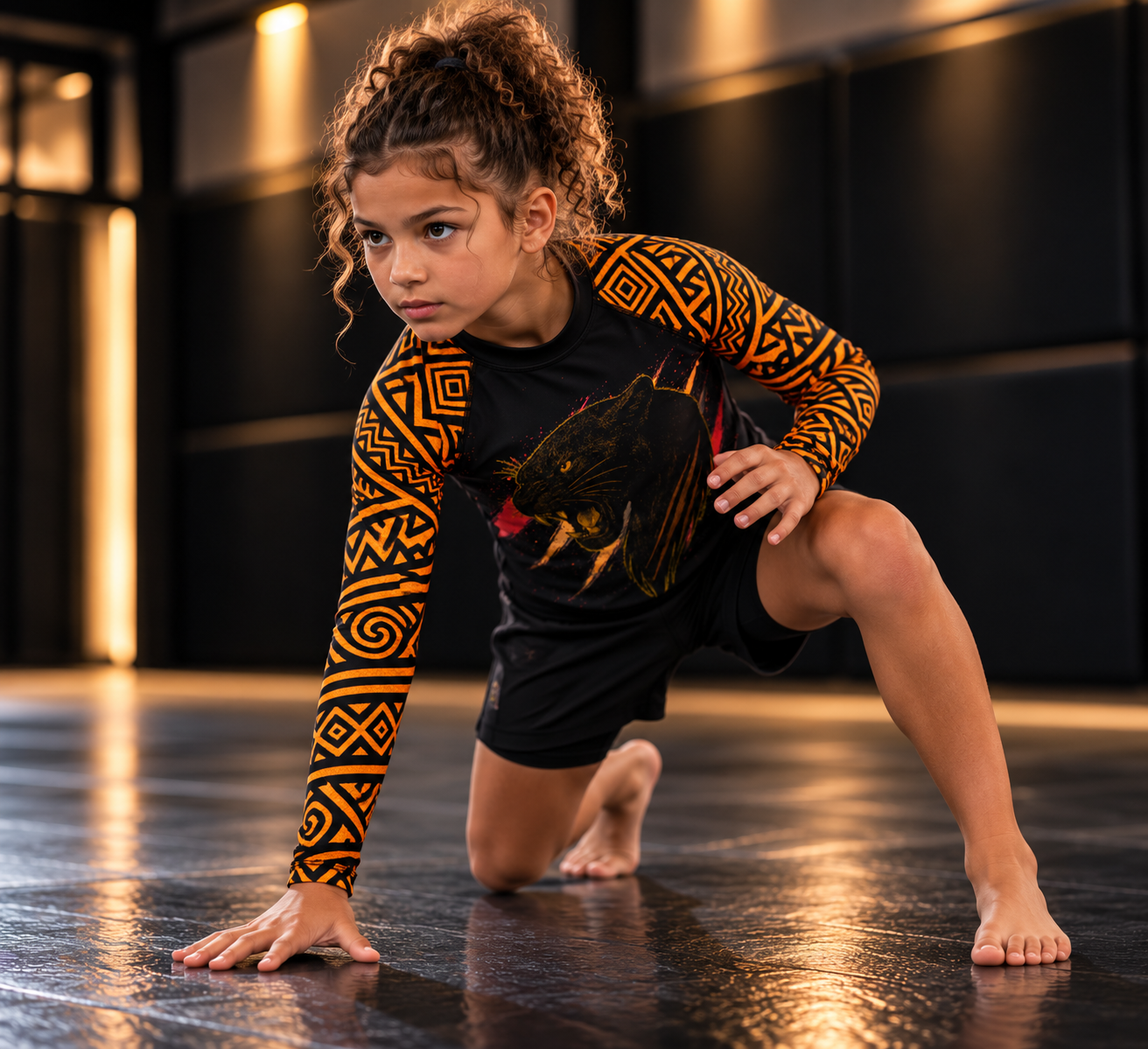 Roll Gear Jaguar Kids BJJ Rash Guard, girl in a low stance on the mat.