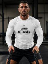 Roll Gear Excuses Don’t Burn Calories Rash Guard – White – Men’s, front view, Earned Not Given chest, during battle ropes.