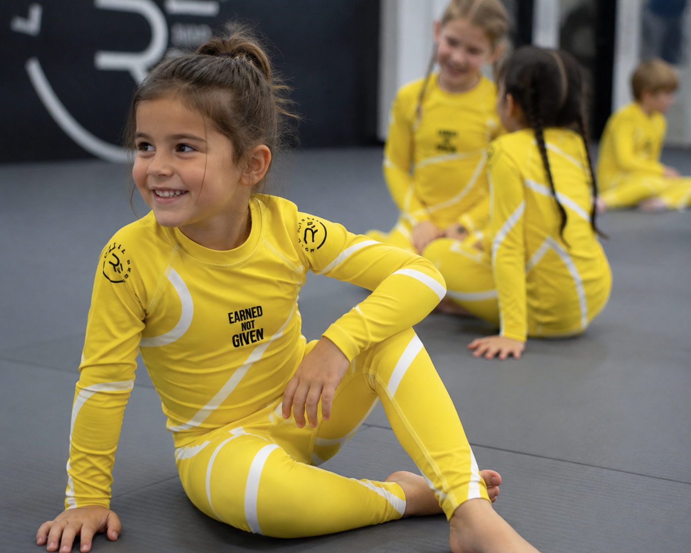 Roll Gear Yellow Swirl Rash Guard - Yellow/White, Kids, product photo, additional angle.