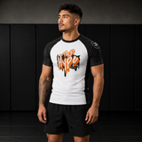 Roll Gear Tap Hype Unisex Short Sleeve Rash Guard, worn by a man standing on the mat, front view.