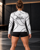 Roll Gear White Swirl Rash Guard – White/Black – Women’s, back view on a woman, Own the Mat. Own the Moment. text.