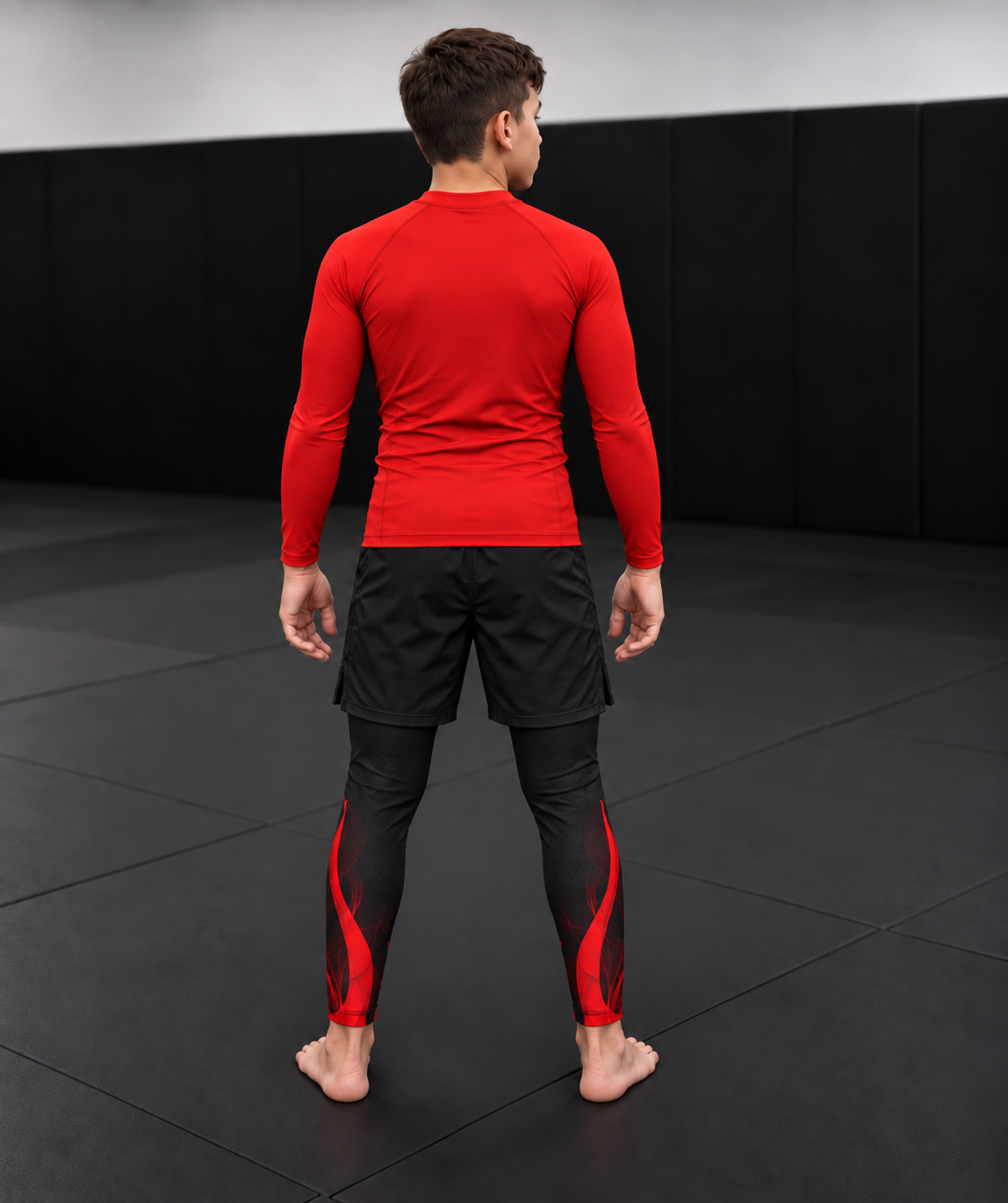 Roll Gear Kids Fire Department Compression Spats – Black with Red Flames, back view on a boy.