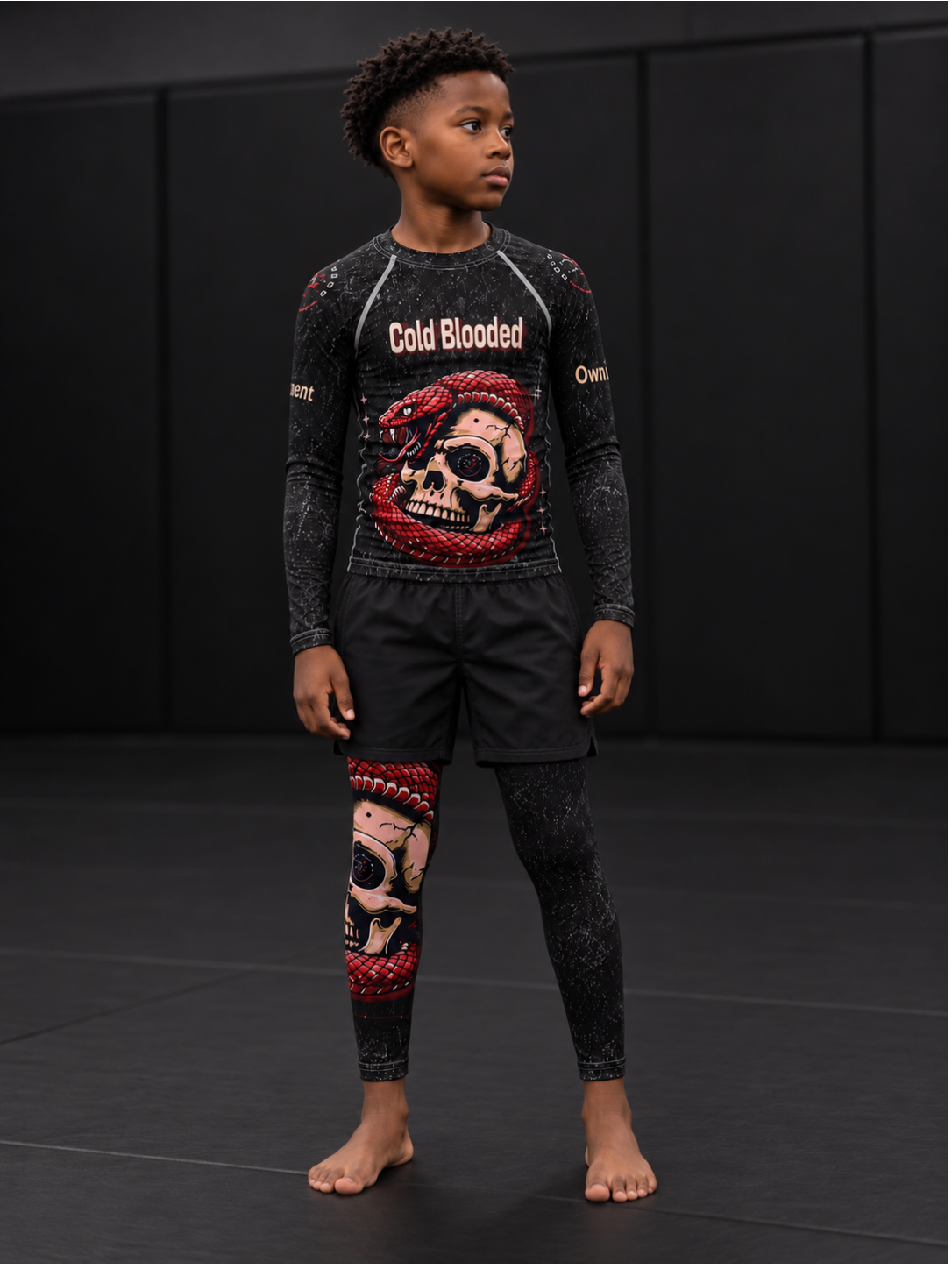 Roll Gear Cold Blooded Rash Guard – Black Venom Athlete Edition – Youth, boy wearing it with matching spats.