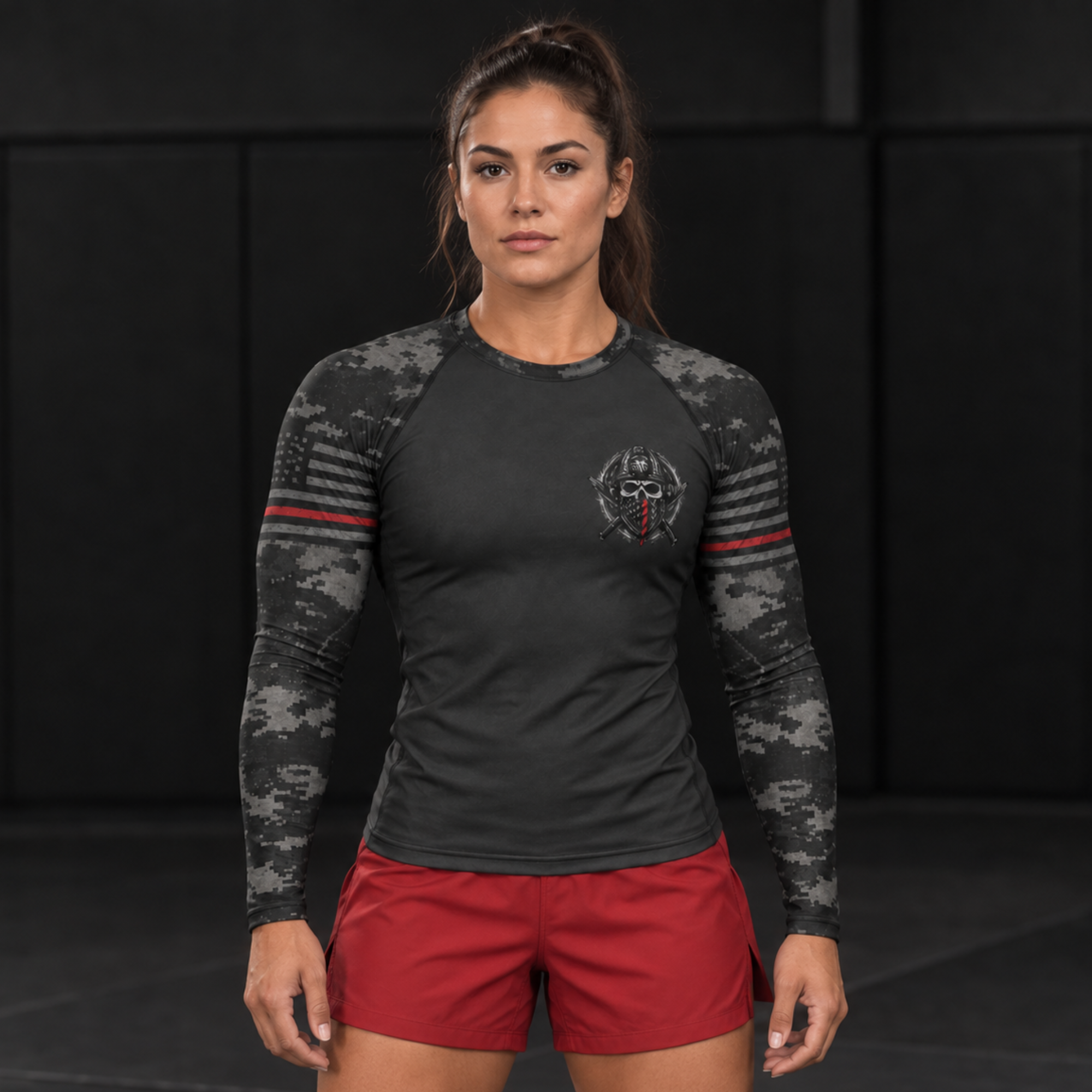 Roll Gear Women's Special Forces Edition Rash Guard, woman standing in a gym, front view.