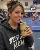 Centerville Wrestling 16 oz Glass Cup with Straw, lifestyle photo.