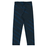 Roll Gear Kids Lion spats in navy with gold accents, back view, showing the full-length compression cut.
