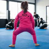 Roll Gear Tap Hype Youth Long Sleeve BJJ Rash Guard – Girls, back view.