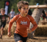 Roll Gear Earned Not Given Long Sleeve Rash Guard - Burnt Orange, Kids, lifestyle photo (boy's fit).