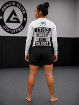 Roll Gear Excuses Don't Burn Calories Women's Long Sleeve Rash Guard - White, back view.