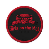 Roll Gear Girls on the Mat Embroidered Patch, black circular, front view.