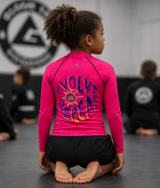 Roll Gear Evolve or Repeat Youth Girls Rash Guard, back view, additional angle.
