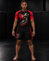 Roll Gear Embrace the Dark Shorts, woman standing on the mat, front view.