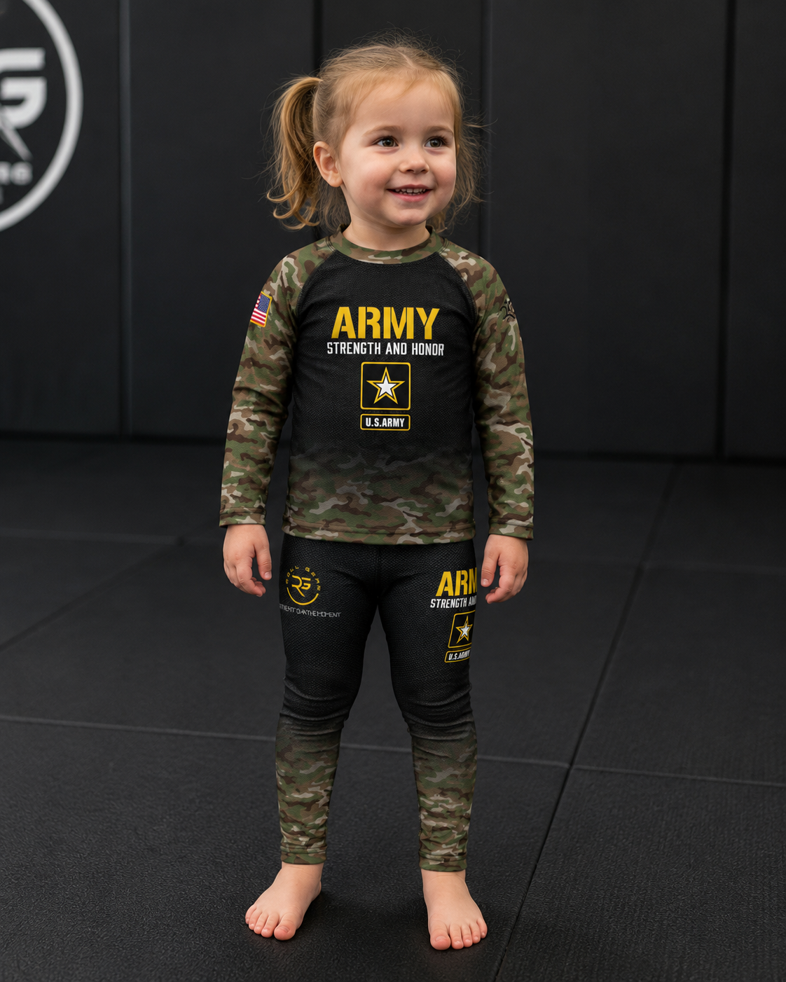 Roll Gear Kids Army Classic Compression Spats, worn by a toddler with the matching Army rash guard.