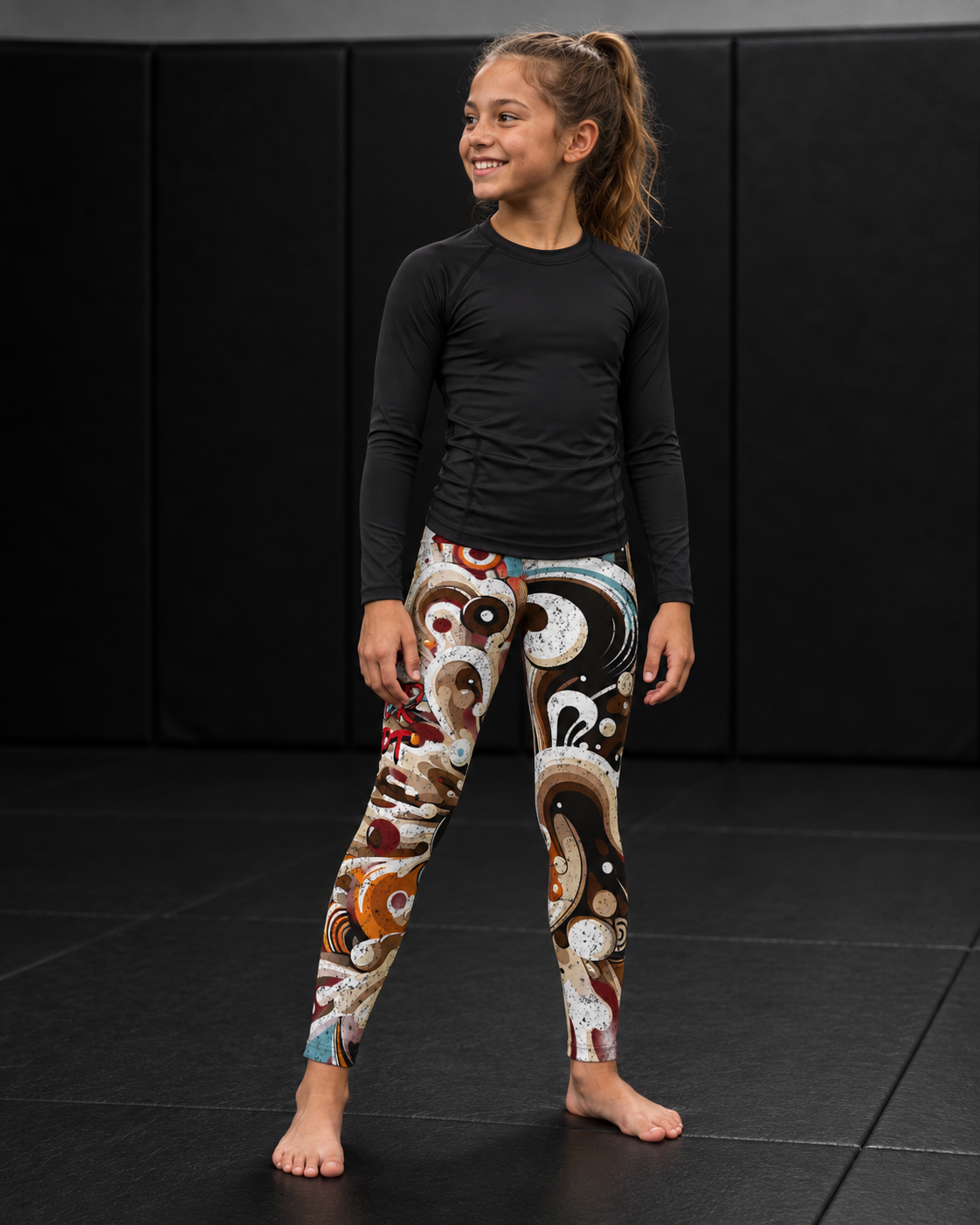 Roll Gear Never Accept Training Spats – Black/Multicolor – Youth, full-length view on a young athlete.