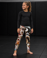 Roll Gear Never Accept Training Spats – Black/Multicolor – Youth, full-length view on a young athlete.