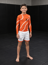 Roll Gear Orange Swirl Long Sleeve Rash Guard - Orange/White, Youth, lifestyle photo, additional angle.
