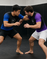 Roll Gear Blue Fade Short Sleeve Rash Guard – ranked fade design for BJJ no-gi training.