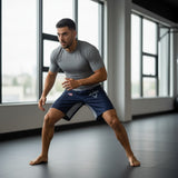 Roll Gear Air Force grappling shorts in navy blue with grey accents and Air Force logo. Features split-leg design.