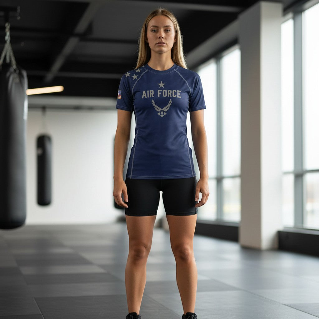 Roll Gear Unisex Air Force short sleeve rash guard in navy blue with silver graphics and US flag detail on sleeve. Compression fit, performance fabric.