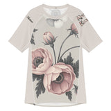 Roll Gear Always Blooming women's short sleeve rash guard with pink floral print and UPF 50+ protection.