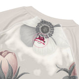 Roll Gear Always Blooming Women's Short Sleeve Rash Guard, close-up of the Girls on the Mat badge at the collar.