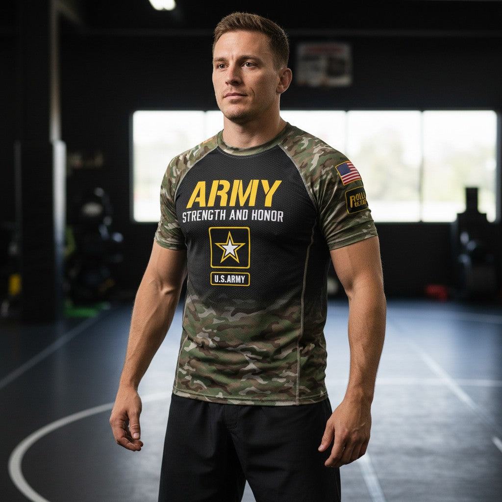 Roll Gear Unisex Army Classic short sleeve rash guard in black with camouflage sleeves, featuring yellow "ARMY STRENGTH AND HONOR" text and U.S. Army logo.