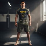 Roll Gear Unisex Army short sleeve rash guard with black body, camo sleeves, yellow U.S. Army logo and star emblem. Made of recycled polyester and elastane.