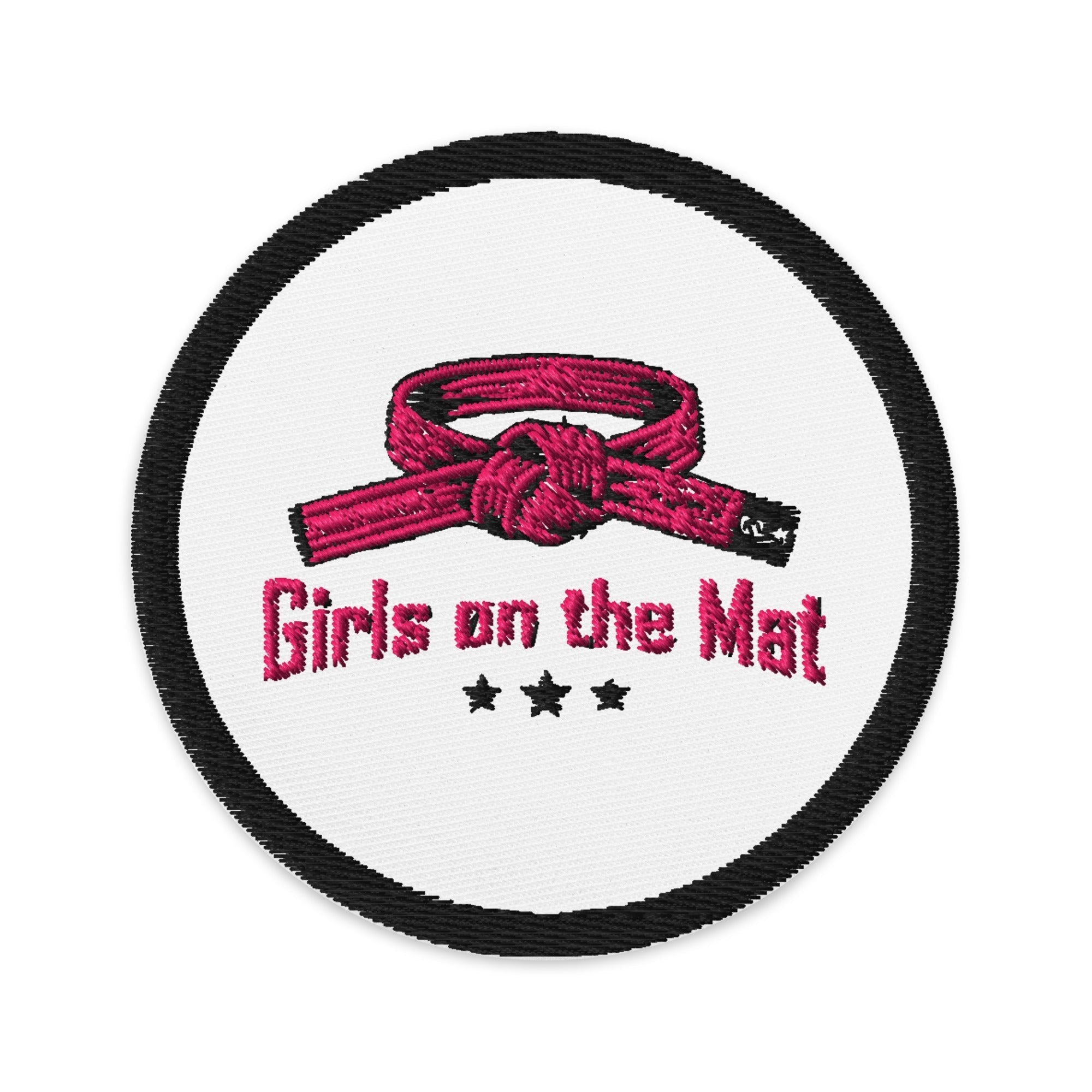 Roll Gear Girls on the Mat embroidered patch, 3-inch circular, black with pink belt and text, iron-on/sew-on/pin attachment.