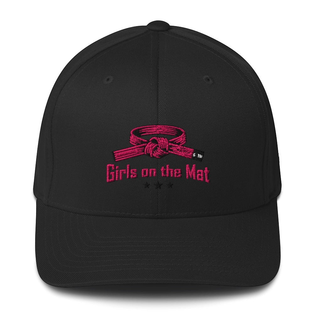 Roll Gear black structured baseball cap with pink embroidered BJJ belt graphic and "Girls on the Mat" text.