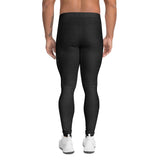 Roll Gear men's black compression spats with thin blue line panels, made of polyester and spandex for grappling.