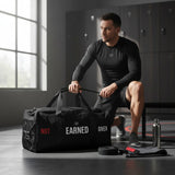 Roll Gear LLC black polyester duffel bag with "Tap Hype" graphic, mesh side pocket, and padded handles.